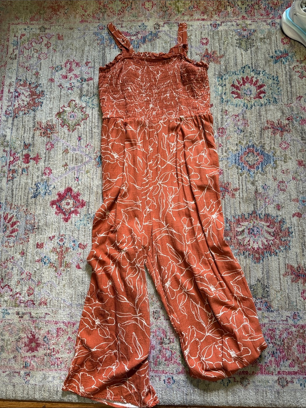 Maurices Rust Orange Floral Smocked Jumpsuit